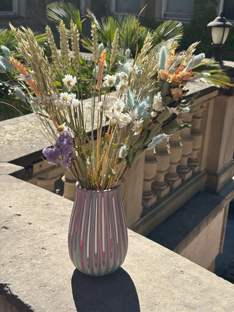 Painted vase with flowers on Vila Engelsmann terrace – original experience Brno
